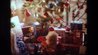 Lansing Michigan (1981): Mother Looks Over The Christmas Decorations