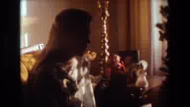 Lansing Michigan (1981): Girl Sitting On Couch Next To A Christmas Tree