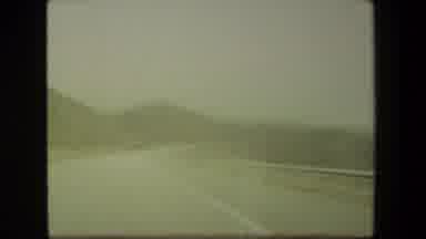 Malibu California USA (1981): View From Vehicle Of Road And Child Standing By Car