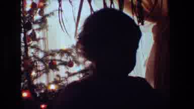 Malibu California USA (1981): Girl Talking And Smiling Behind A Naked Man In A
