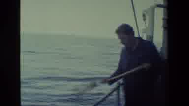 San Diego Naval Base (1981): A Ship Out On The Ocean And A Man Throws His
