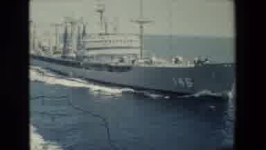 San Diego Naval Base (1981): Large White Ship Gliding Through The Water