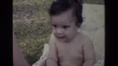 San Antonio Texas (1982): Baby Sitting In Chair Playing With Some People In Park