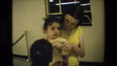 San Antonio Texas (1982): Baby Drinking Milk With Mother Holding On Arms And Then