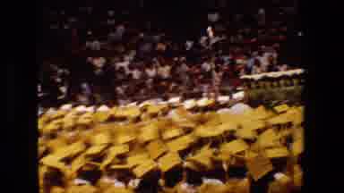 Lansing Michigan (1983): Students At Graduation While A Crowd Watches The Event