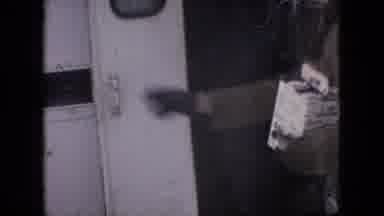 Philadelphia Pennsylvania USA (1964): Person Opening Door And Man Driving A Snow