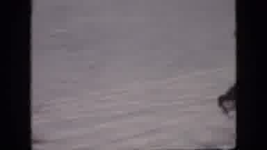 Philadelphia Pennsylvania USA (1964): A Kid Sliding Down A Snowy Hill
