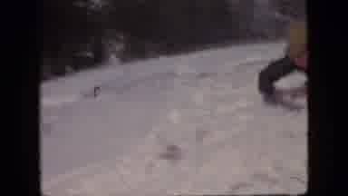 Philadelphia Pennsylvania USA (1964): Man And Boy Sledding Down A Snowy Hill