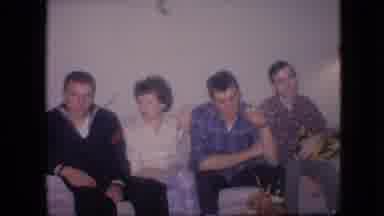 Philadelphia Pennsylvania USA (1964): A Group Of People Sitting On A Couch And