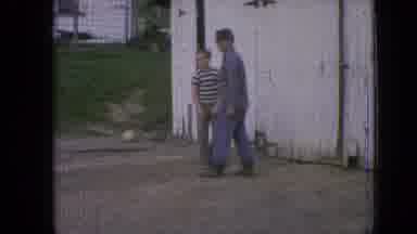 Philadelphia Pennsylvania USA (1964): Kids Having Fun Playing Basketball While Dad