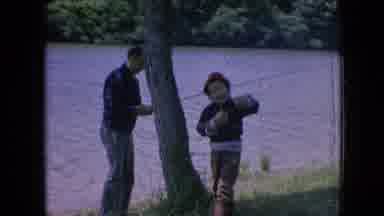 Philadelphia Pennsylvania USA-1964: A Motorboat Cruises A Body Of Water Where A