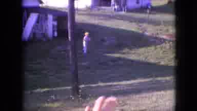 Philadelphia Pennsylvania USA (1964): A Boy Waving Hi And Then Kicking A Soccer