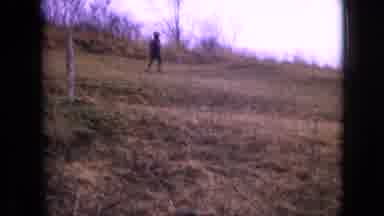 Philadelphia Pennsylvania USA (1964): Little Kid Runs Up And Down A Hill