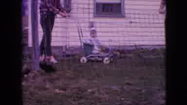 Philadelphia Pennsylvania USA (1964): Woman Trying To Entice Baby To Wave For