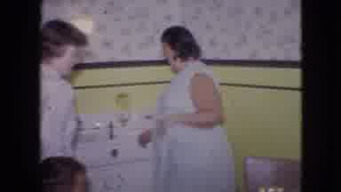 Philadelphia Pennsylvania USA (1964): Family In Crowded Kitchen Preparing Birthday