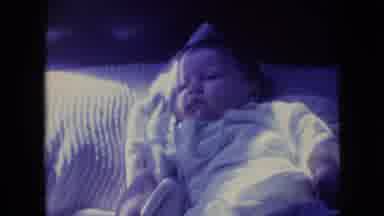 Philadelphia Pennsylvania USA (1964): Baby In White Laying On Back
