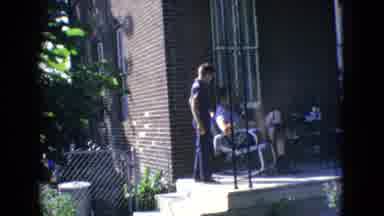 New Jersey USA (1965): Children Relax With Family On Porch
