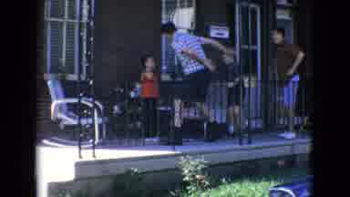 New Jersey USA (1965): Four Boys Playing On A Porch