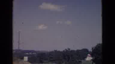New Jersey USA (1965): Clouds, And Then A Trapeze Artist Dangling From A Rope