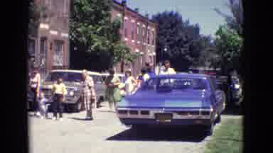 New Jersey USA (1965): Women, Men And Children Standing Around Cars Waves Under A
