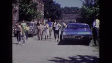 New Jersey USA (1965): 90s Error Child Walking In A Group Of White People Who Are
