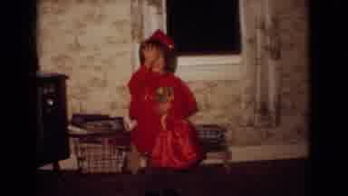 New Jersey USA (1965): Baby In High Chair, Woman In Christmas Elf Suit With A Doll
