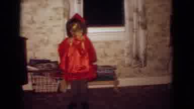 New Jersey USA (1965): Girl Dresses Up In The House To Match Her Red Doll