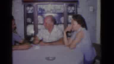 New Jersey USA (1965): Older Family Sitting At Dinner Table In The Dining Room