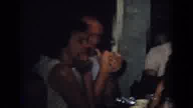 New Jersey USA (1965): People Eat, Drink, And Socialize Around A Dinner Table