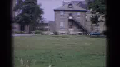 New Jersey USA (1965): Buildings With A Large Lawn And Parking Lot Followed By Two