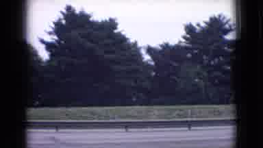 New Jersey USA (1965): Man In White Shirt And Cars Driving Through Tunnel