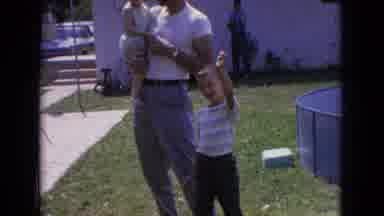 New Jersey USA (1965): Father With His Children Waving Goodbye To Someone In Their