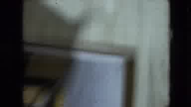 Athens Ohio USA (1966): A Standing Man Yawns While Inside A Room With Oak Paneling