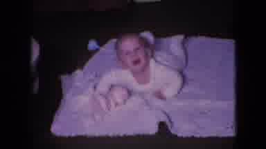 Athens Ohio USA (1966): Month Baby Lying On The Floor Raising His Head, Paying