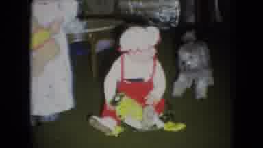 Athens Ohio USA (1966): Cute Dog Runs Around Baby That Sits At Home