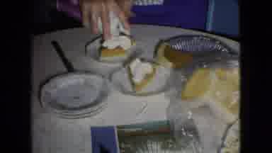 Athens Ohio USA (1966): Woman Putting Whip Cream On Pumpkin Pie In Kitchen