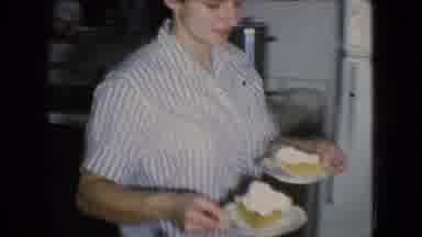 Athens Ohio USA (1966): Parent Serving Food To Children