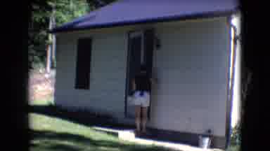 Athens Ohio USA (1966): Woman Standing At The Door