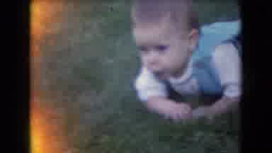 Athens Ohio USA (1966): Baby In Blue Overalls Crawling On Grass