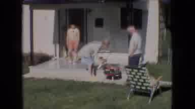 Athens Ohio USA (1966): Grilling At A Home With Three People Then A Child Appears