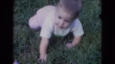 Athens Ohio USA (1966): Baby Girl Crawls On Grass While Sister Runs With The Puppy