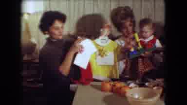 Athens Ohio USA (1966): Women Holding Up Clothing With Kids