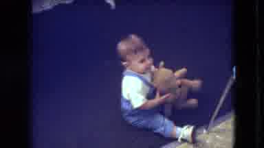 Athens Ohio USA (1966): Infant Child Holding Teddy Bear