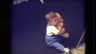 Athens Ohio USA (1966): Little Boy Cuddling With His Teddy Bear In His Living
