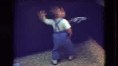 Athens Ohio USA (1966): Child Grasps Cloth