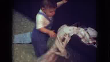 Athens Ohio USA (1966): Baby In Overalls Removing Folded Clothes From Drawer