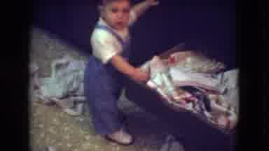 Athens Ohio USA (1966): Baby Standing Alone And Investigates A Drawer