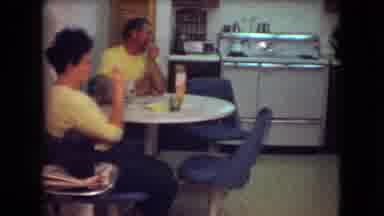Athens Ohio USA (1966): Keeping A Child Occupied In The Kitchen With A Stuffed