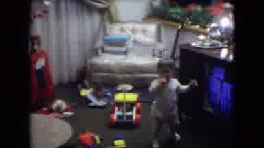 Athens Ohio USA (1966): A Baby Walking Around A Messy Floor