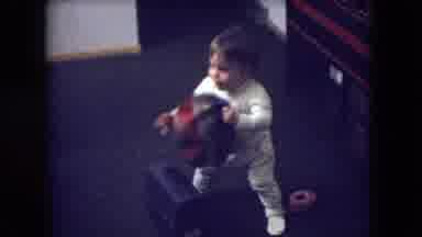 Athens Ohio USA (1966): Toddler Discovering And Learning How To Wear A Hat